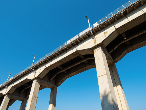 Modern steel bridge structure spanning river, large span design, contemporary engineering architecture
